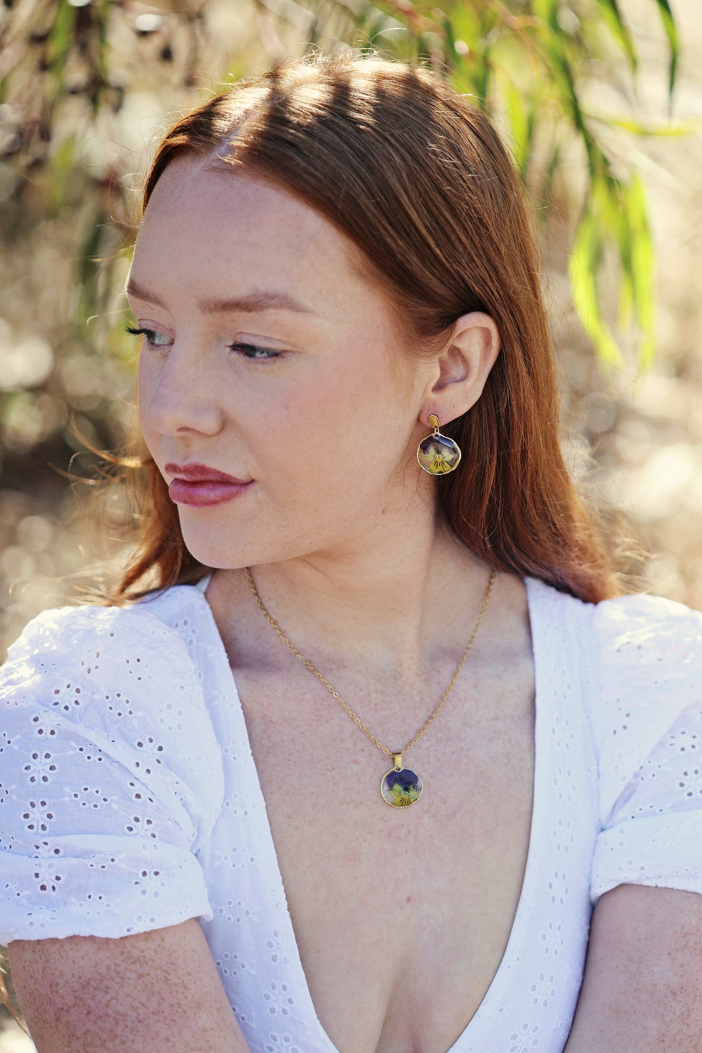 Dried purple Pansy flower in Resin | 18K Gold Plated | Round shaped | Botanical jewelry