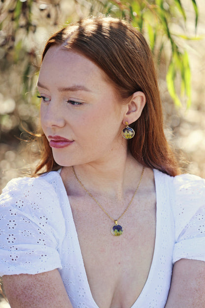 Dried purple Pansy flower in Resin | 18K Gold Plated | Round shaped | Botanical jewelry
